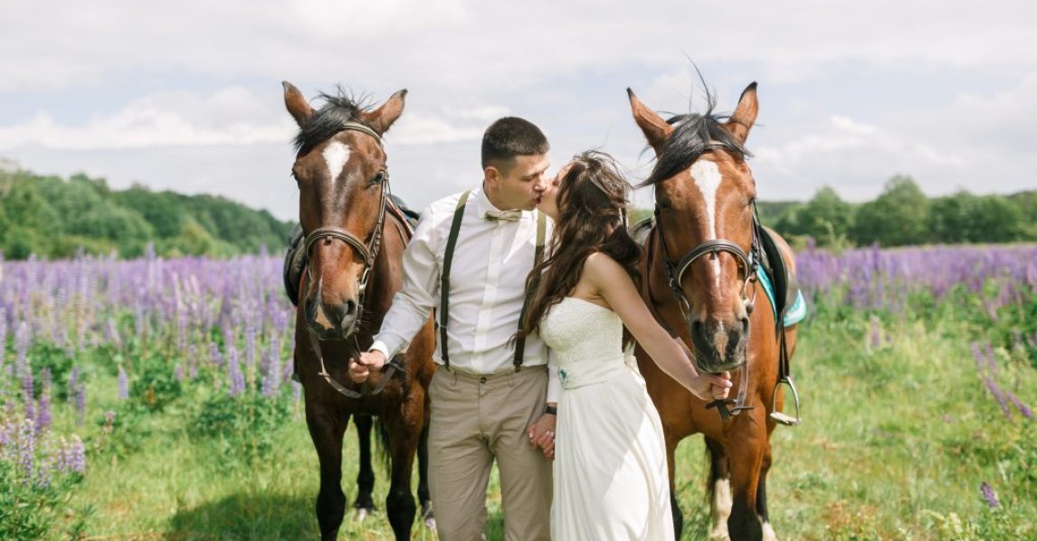 Wedding couple horses on the ranch